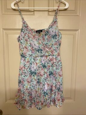 NWOT Floral Wrap Romper in Light Blue